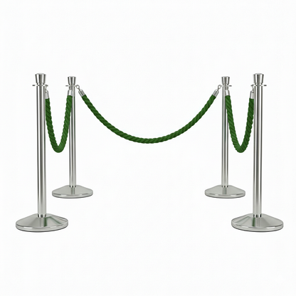 Set of silver stanchions with green velvet ropes on a white background