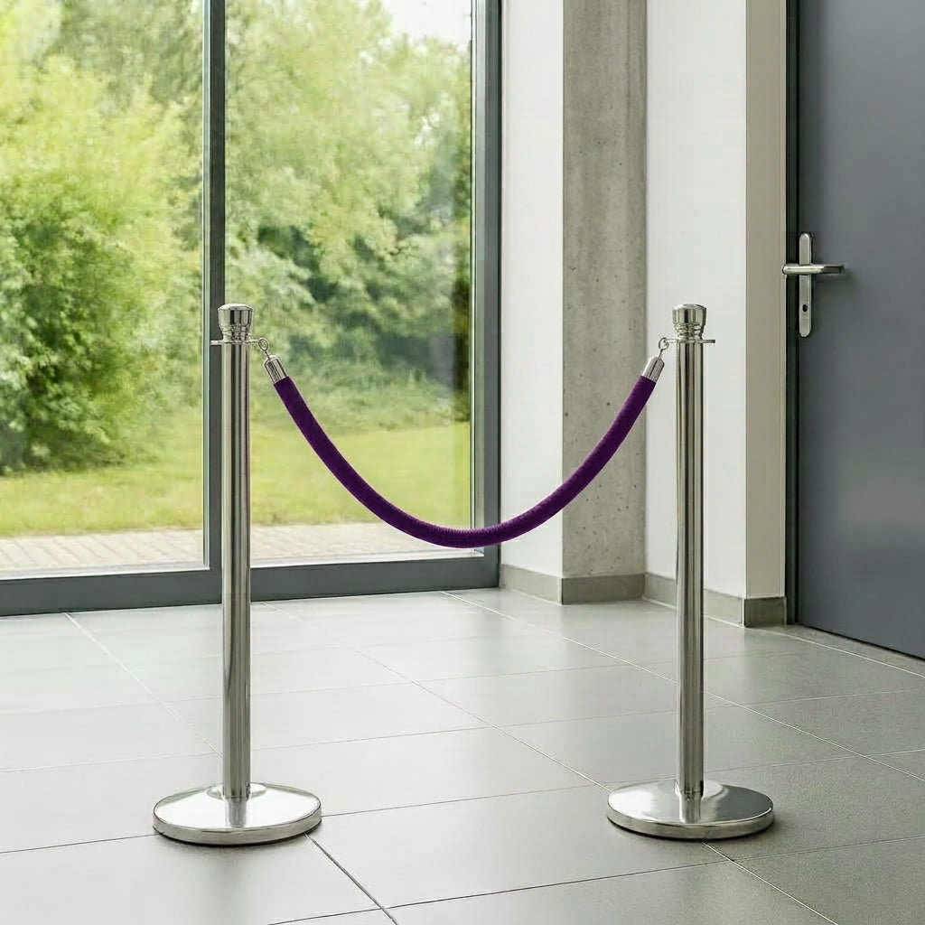 COCUS purple velvet rope barriers set up in a modern entrance